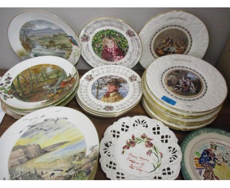 A quantity of twenty nine mixed pictorial and Christmas plates by Royal Worcester and other manufacturesLocation: RWB 