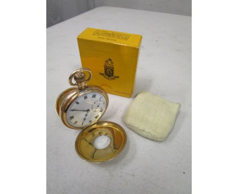 A gold plated manual wind half hunter gentleman's pocket watch, white enamel Roman dial with off set seconds at 3, the outer 