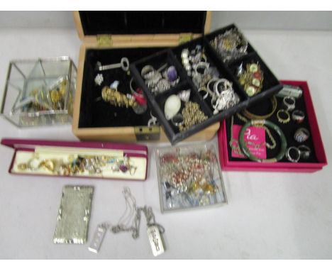 A selection of costume jewellery to include silver Mexican bracelet, silver rings, two silver ingot pendants on chain necklac