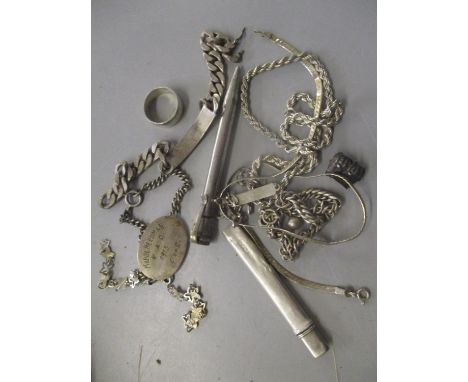 A mixed lot of silver and white metal to include a silver bracelet, ring and other items 