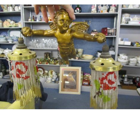 A mid 20th century gilt ceiling light with bead shades 