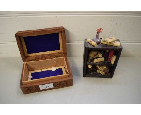 SMALL CARVED ASIAN JEWELLERY BOX TOGETHER WITH A MINIATURE MODEL OF A SHELF UNIT AND CONTENTS