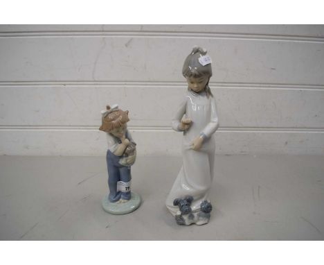 TWO NAO FIGURINES OF CHILDREN