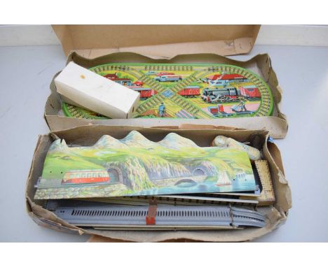 MIXED LOT COMPRISING A VINTAGE METAL MAGIC SHUNTING TRAIN, TOGETHER WITH A VINTAGE TECHNOFIX MOUNTAIN EXPRESS METAL TRAIN SET