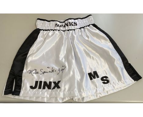 Boxing Michael Spinks signed replica black and white Boxing Shorts. Michael Spinks (born July 13, 1956) is an American former