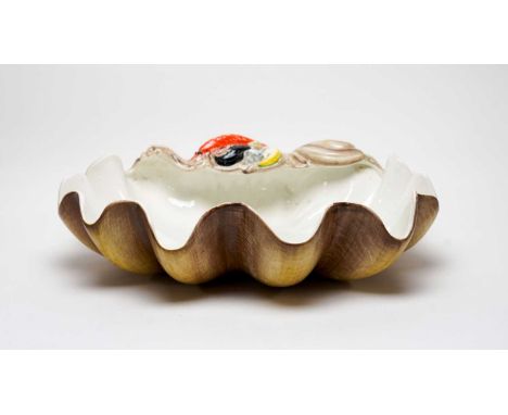 A vintage Italian ceramic seafood serving platter, by Te Art, in the form of a shell with frilled edges, 48cms wide. 