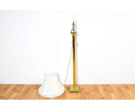 A classical style brass standard lamp in the form of a Corinthian column, 167cm high.