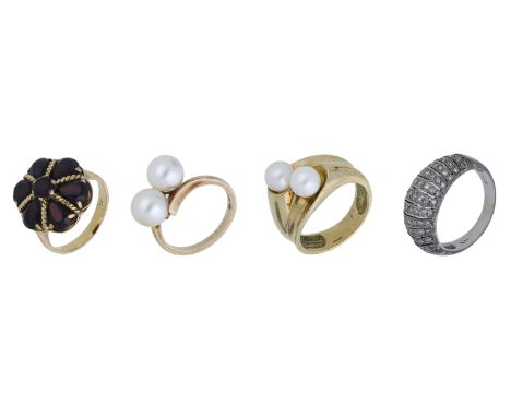 Four gem-set rings, comprising a garnet cluster ring, stamped ‘18K’, a 9ct gold cultured pearl crossover ring, a further cult