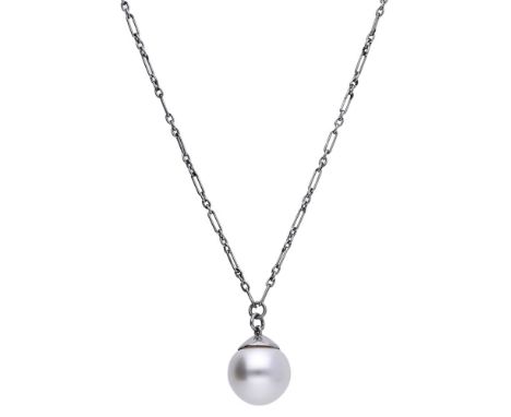 An Art Deco natural pearl pendant, the fine-fancy link chain leading to a natural pearl drop measuring approximately 10.3 x 9