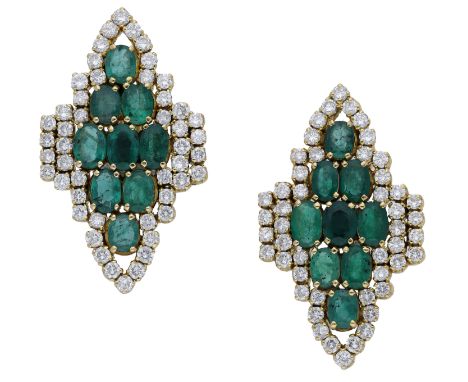 A pair of emerald and diamond cluster earrings, the lozenge-shaped clusters claw-set with a series of oval mixed-cut emeralds