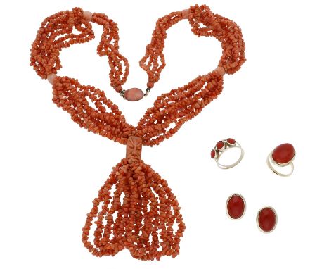 A small collection of coral jewellery, comprising a Corallium rubrum cabochon ring and ear clip suite, the ear clips stamped 