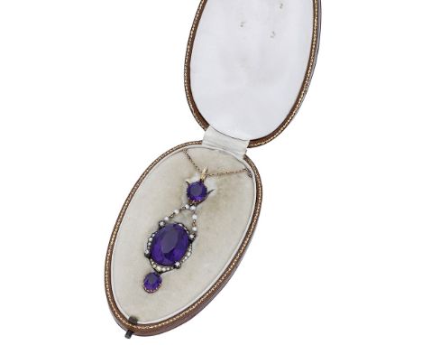 An early 20th century amethyst, seed pearl and diamond pendant on chain, the pendant comprising a circular-cut amethyst surmo