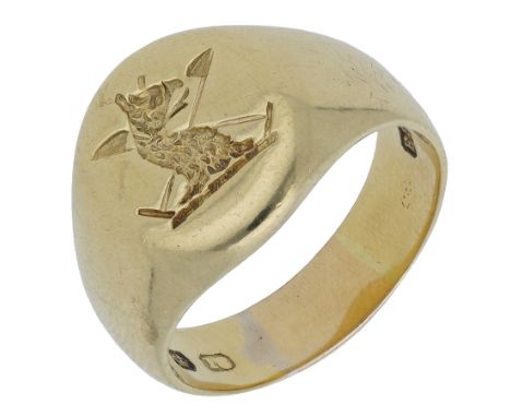 A gentleman’s 18ct gold signet ring, bearing the crest of the head of a eagle, crossed flags behind, bearing partial hallmark