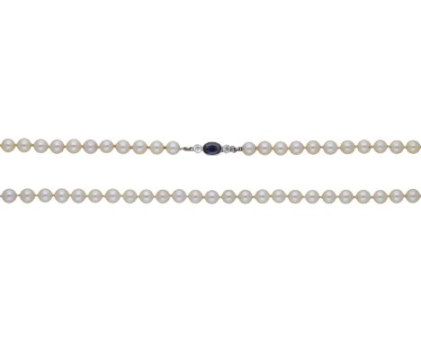 A cultured pearl necklace with sapphire and diamond clasp, the single row of cultured pearls to a clasp set with an oval-cut 
