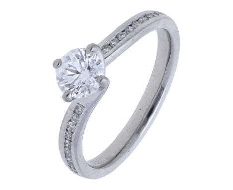 A solitaire diamond ring, the brilliant-cut diamond weighing 0.57 carat, claw set within twist setting, between similarly-cut