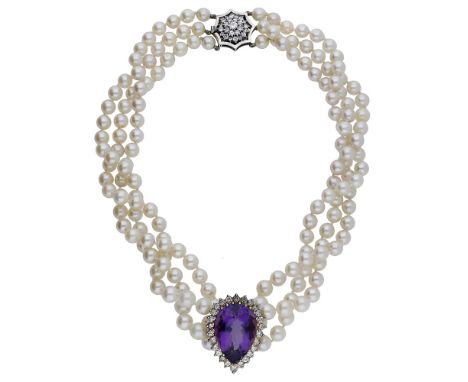 A cultured pearl collar necklace, comprising three rows of uniform cultured pearls with a brilliant-cut diamond cluster clasp