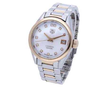 Tag Heuer. A lady’s stainless steel, gold and diamond-set automatic wristwatch with date and bracelet, Ref. WAR24XX-CS, circa