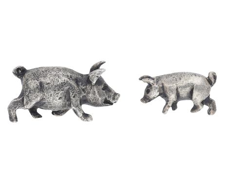 Two miniature silver pigs by Stuart Devlin, each stamped with maker’s mark ‘SD’ and London hallmark for 1974, larger pig leng