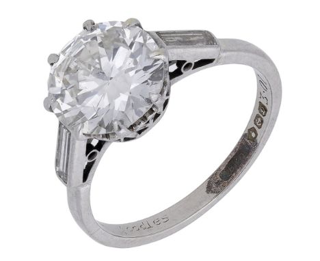 A diamond single stone ring by Boodle &amp; Dunthorne, the principal brilliant-cut diamond claw set between baguette-cut diam