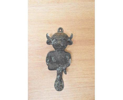 A cast metal Lincoln Imp door knocker, as seen in Lincoln Cathedral.