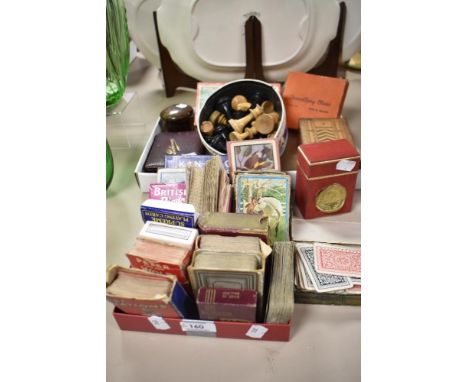 A variety of vintage games, including travelling chess, puzzle knots, card games , playing cards etc.