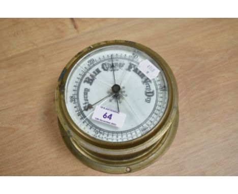A brass cased ship's barometer.