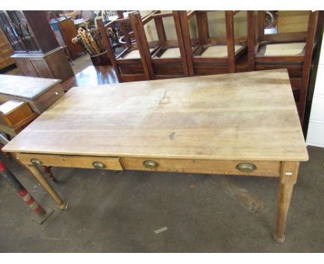 Early C20th light oak two drawer table on pad feet W889cm L183cm H75cm 