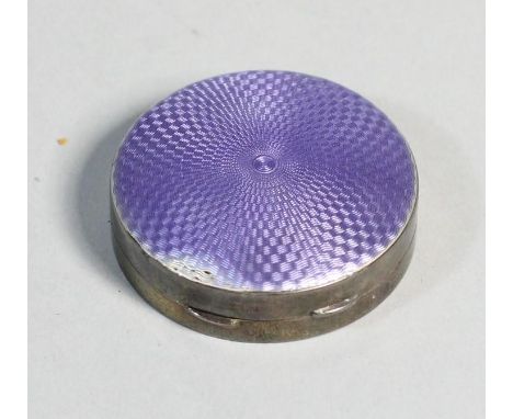 A silver and enamel powder box, Birmingham 1928, opening to reveal a mirror and powder, 5cm 