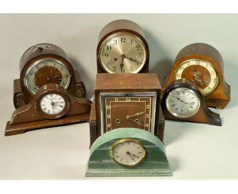 A collection of mid Century manual wind mantle clocks. (2) 