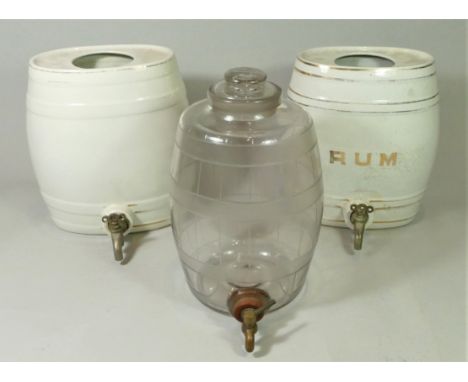 A mid 20th century glass barrel spirit dispenser, two ceramic versions together with a Royal Worcester posy vase, mid Century