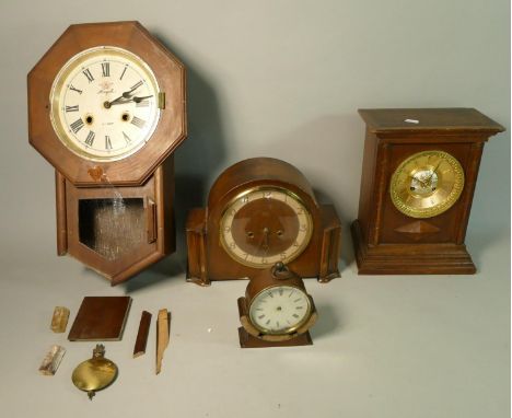 A 31 day 'Angel' wall clock together with two manual wind mantel clocks. 