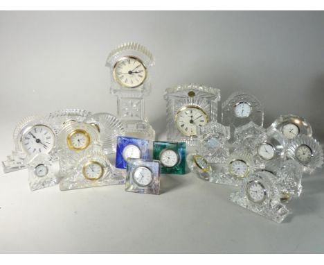 Three Caithness glass paperweight clocks, two Waterfront crystal clocks and other glass clocks