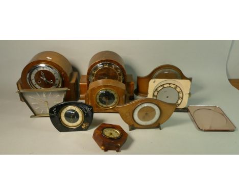 A collection of mid Century manual wind mantel clocks. (2) 