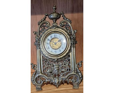 A Victorian cast brass pierced easel mantle clock, 31cm 