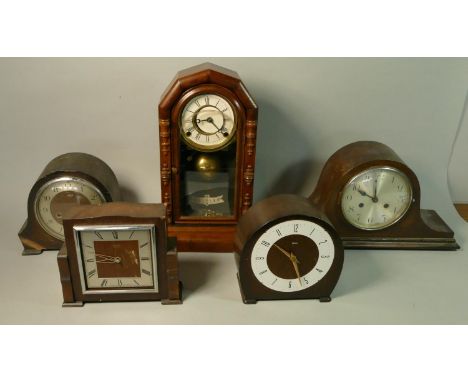 A collection of mid Century manual wind mantle clocks. (2) 