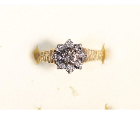 A 9ct gold and diamond cluster ring, M 1/2, 2.3gm 