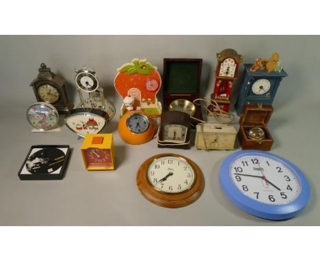 A collection of mantel clocks to include advertising &amp; novelty with manual and quartz movements. (2) 