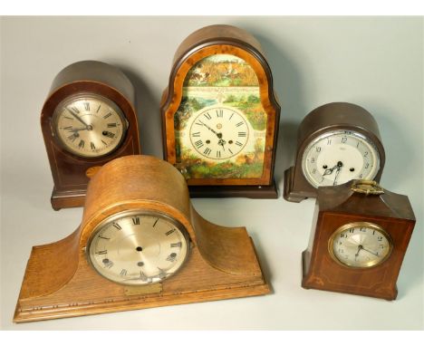 A mahogany inlaid manual wind mantle clock together with an oak cased Westminster chime, a Smiths bakelite, and other mantle 