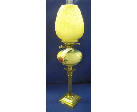 Early 20th Century brass, Corinthian column double burner oil lamp, having florally decorated reservoir, clear glass funnel a