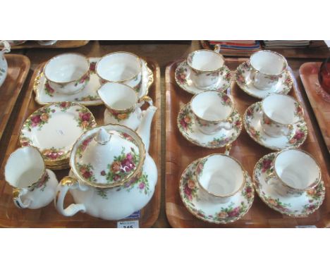 Two trays of Royal Albert 'Old Country Roses' bone china tea service comprising: cups and saucers; two milk jugs; two sucrier