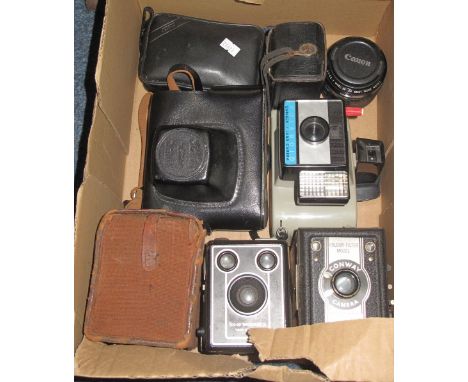 Tray of assorted cameras and accessories to include: Conway; Polaroid; Box Brownie; Canon lens etc.(B.P. 24% incl. VAT)