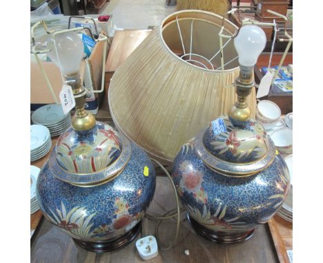 Modern ceramic table lamps and shades decorated with flowers on a scroll blue ground. (2)(B.P. 24% incl. VAT)