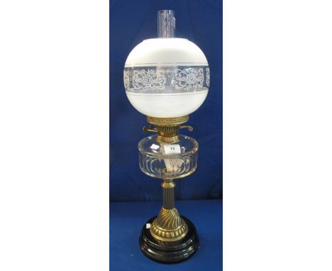 Early 20th Century brass column double burner oil lamp with clear glass reservoir, spherical shade and clear glass funnnel.(B