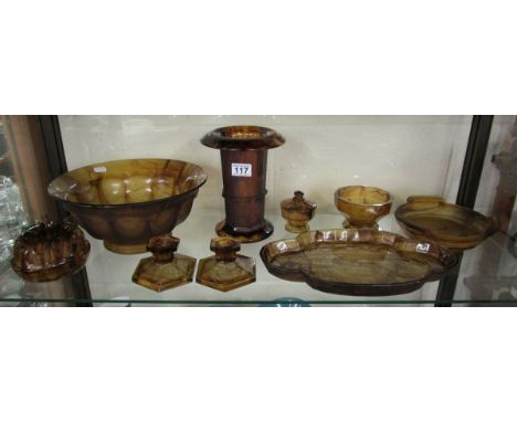 Shelf of Davidson cloudy amber glass