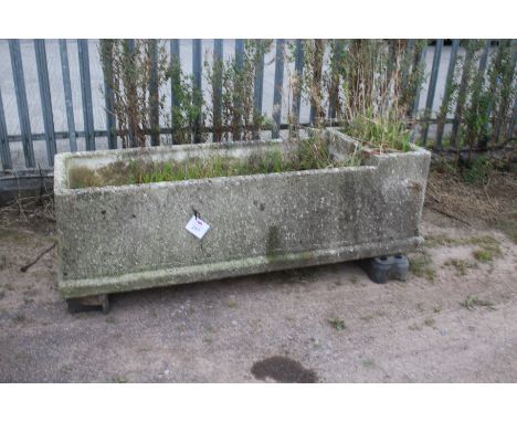 A large concrete livestock drinking trough/planter. In rectangular forn raised on a square base, base appears sound, H50cm x 