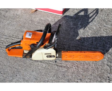 A Stihl MS210 chainsaw. Petrrol powered complete with fuel can, gloves, visor and ear defenders etc, untested.