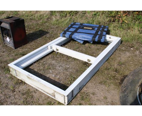 A UPVC double glazed sash window. The frame complete with latches and glass panels to suit, bought new never fitted, 200cm x 