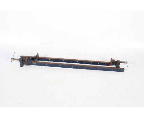 Two vintage cast metal sash clamps. Painted blue complete with pins, L132cm.