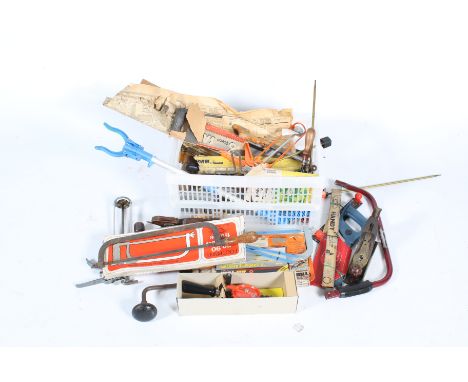 A collection of workshop tools. Noting a boxed Stanley hand drill plus other drills, saws and planes, etc. 