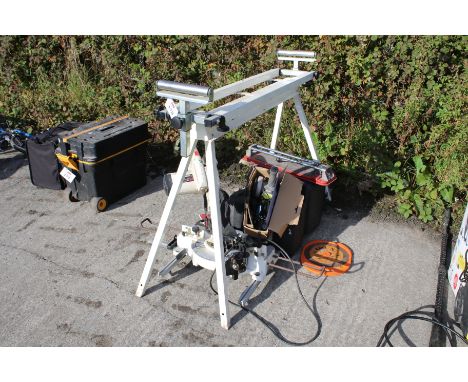 A collection of power tools and a work bench. The bench of aluminium together with an Axminster circular saw and Ryobi grinde